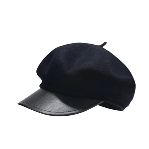 Retro black wool newsboy cap with leather brim, stylish British baker boy hat for women