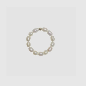 Detailed view of handmade freshwater baroque pearl ring with small metal bead