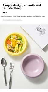 Ceramic donut bowl with fresh garden salad showing smooth rim and deep round capacity