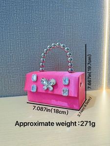 Pink satin evening clutch with rhinestone butterfly buckle and silver ball handle