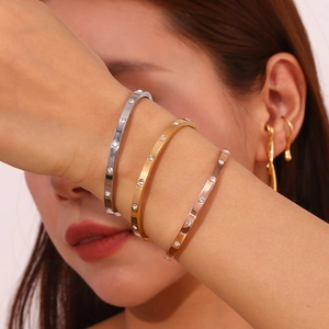 Minimalist 18K gold plated stainless steel bangles with zircon dots for women