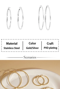 Detailed view of polished gold and silver stainless steel hoop earrings with PVD plating