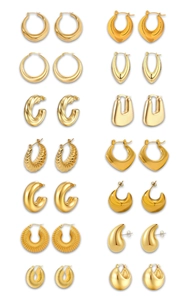 Detailed set of 14 pairs of gold-plated chunky hoop and geometric earrings on white background