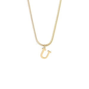 Detailed view of capital letter U gold pendant on a minimalist snake chain necklace