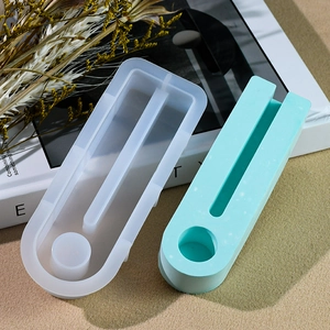 DIY oval silicone mold for epoxy resin candles and holders with mint green finished piece