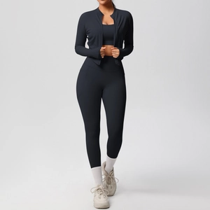 Three-piece athletic set with zip-up jacket, sports bra, and high-waisted yoga pants