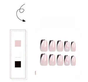 Detail showing 10pcs pink and black French line press-on nails with heart patterns