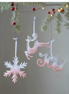 Pink translucent Christmas tree ornaments set with snowflake, reindeer and JOY design