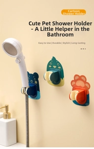 Adjustable cartoon bear wall-mounted shower head holder in a cozy bathroom setting