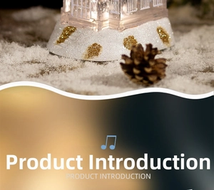Close-up of a festive Christmas crystal church music box base with LED light and white glitter