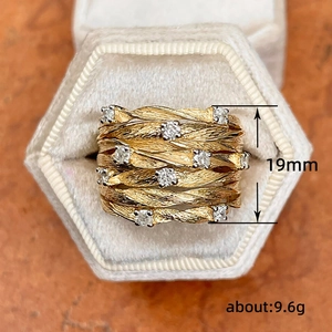 Golden multi-layer vine wrap ring with star zircons in a beige velvet gift box