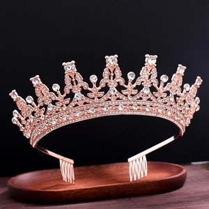 Detailed macro of rose gold bridal tiara with sparkling rhinestones and metal combs
