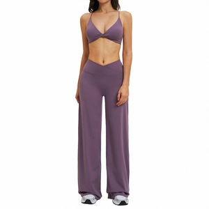 Women's two-piece yoga set with cross waist wide-leg pants and twist front sports bra