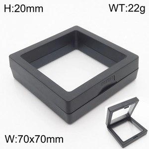 Detail view of black 70x70mm PE film floating jewelry box with push button and slim frame