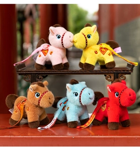 Colorful Year of the Horse plush toy mascots with traditional lucky ribbons and charms