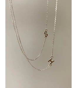 Minimalist S925 sterling silver necklace featuring S and H letter charms on a thin chain