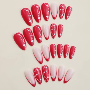 Red almond French press-on nails with white heart patterns and wavy lines set of 24