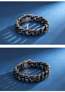 Macro view of retro 304 stainless steel men's chain bracelet with engraved totems