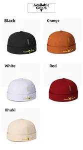 Detail of multi-color cotton docker hats featuring Freedom embroidery and side stitch