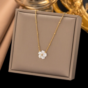 Elegant 18k gold-plated titanium steel necklace with a white shell flower pendant