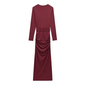 Elegant burgundy long-sleeve maxi dress with ruched waist and matching belt detail