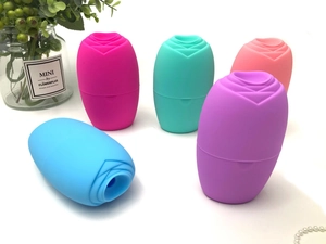 Detailed view of colorful rose-shaped silicone ice rollers for facial massage and skin care