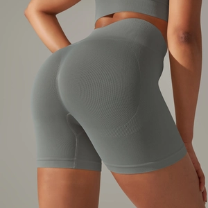 Detail view of grey seamless gym shorts with push-up contouring and high waist fit