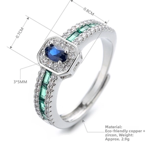 Detail view of emerald-cut blue and green zircon rings with silver-tone band