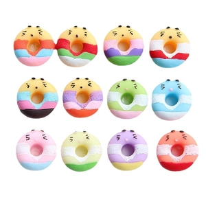 Set of 12 colorful resin donut charms with cute cartoon expressions for DIY crafts