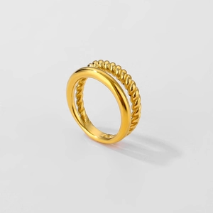 Polished gold double layer ring featuring a minimalist band and twisted rope texture design