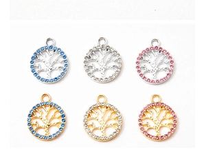 Detailed view of Tree of Life pendants featuring sparkling rhinestones in assorted colors
