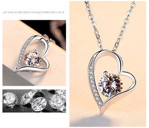 Detail shot of heart-shaped S925 silver necklace with round moissanite pendant