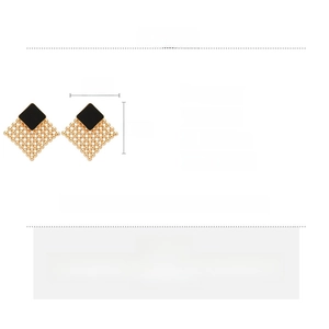 Detail view of gold woven diamond earrings with black square accent and size specs