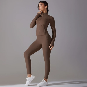Brown two-piece yoga set featuring a slim-fit zip jacket and high-waisted leggings