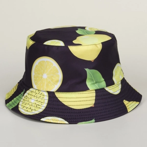 Navy blue bucket hat featuring a vibrant yellow lemon fruit pattern and wide sun brim