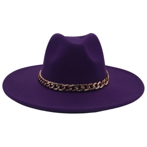 Detail of a purple wide-brim felt hat featuring a decorative chunky gold acrylic chain