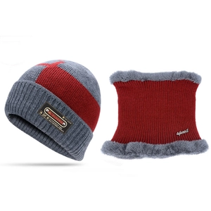 Detail of winter knitted hat and neck gaiter set with warm plush lining in grey and maroon