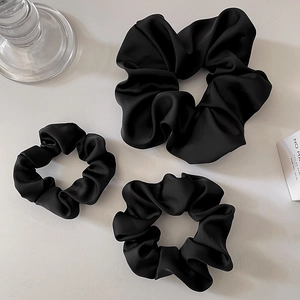 Three-piece set of matte black satin hair scrunchies in various sizes for women