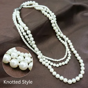 Three-layer knotted white pearl necklace for women with secure metal clasp design