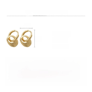 Detailed view of gold oval earrings featuring hammered texture and double hoop design