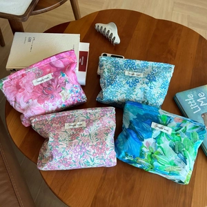 Floral cotton makeup pouches with Liberty print and zipper closure in four colors