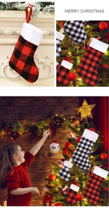 Detail of red and black buffalo plaid Christmas stockings with plush white cuff