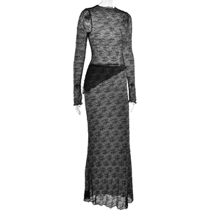 Detail of sheer black lace fabric with floral patterns and side asymmetric fabric splicing