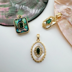 18K gold plated pendants with emerald green stones and natural shell inlay