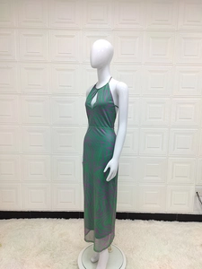 Detail of green and purple zebra print halter dress with side slit and slim fit design
