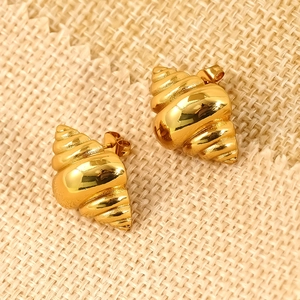 Elegant gold seashell stud earrings in polished stainless steel on a burlap texture