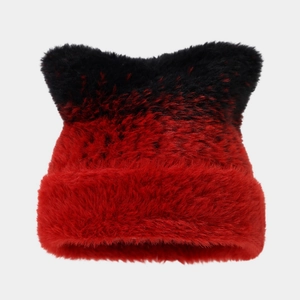 Close-up of red and black gradient cat ear beanie in fluffy faux fur material