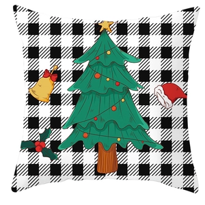 Detail of Christmas tree pattern on buffalo plaid decorative pillowcase fabric