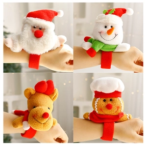 Detail showing plush Christmas slap bracelets with Santa, snowman, reindeer and gingerbread man