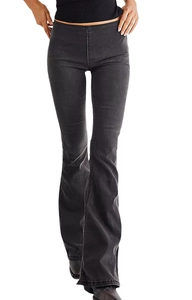 Detailed side view of women's slim fit black flare denim jeans showing the leg cut